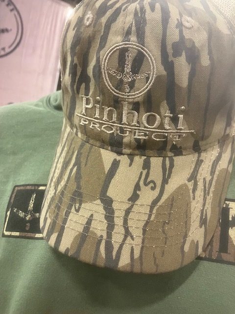 A Dave Owens Pinhoti Project hat and shirt.
